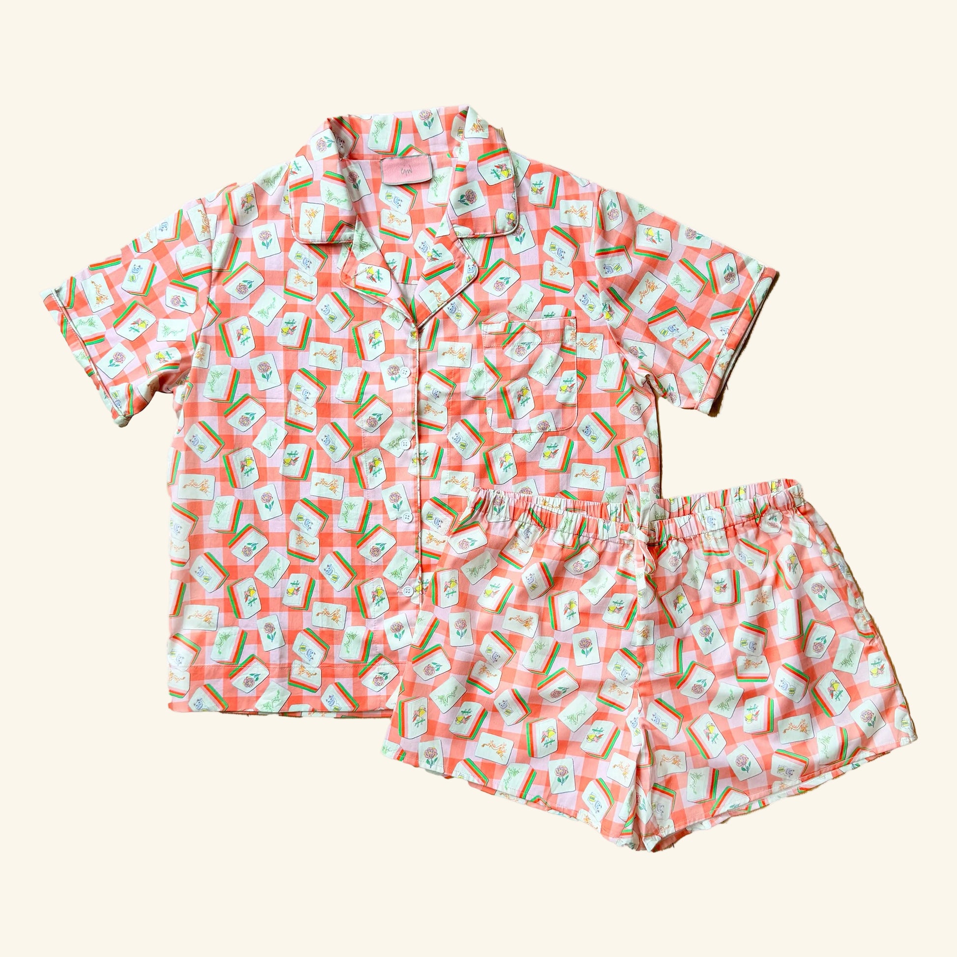 CJW Mahjong Short PJ Set flat lay — hand-illustrated mahjong tiles on pink gingham cotton pajamas