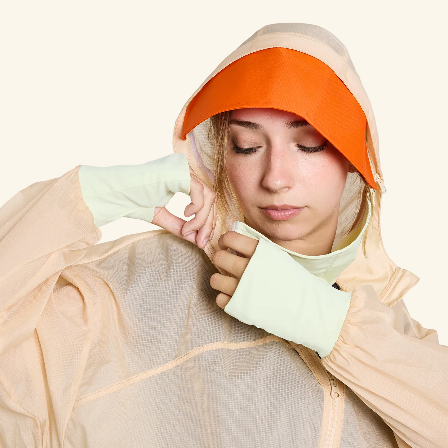 Removable face mask detail on CJW Sun Jacket in cream