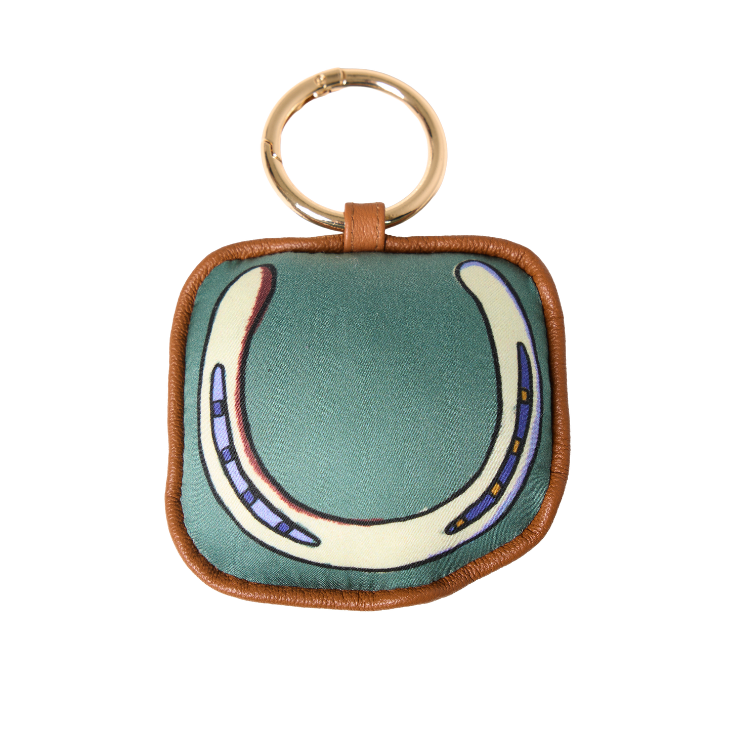 A silk and leather lucky horseshoe bag charm designed for equestrians who believe in barn magic — a subtle good-luck charm for show days, stable life, and everyday adventures.
